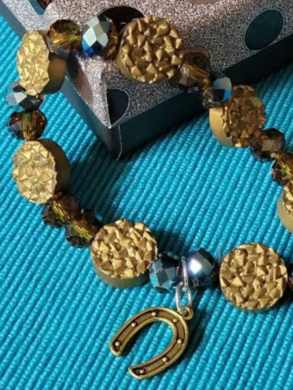 Rock-Like Beads Intertwined with White and Gold Beads with Silver Dividers